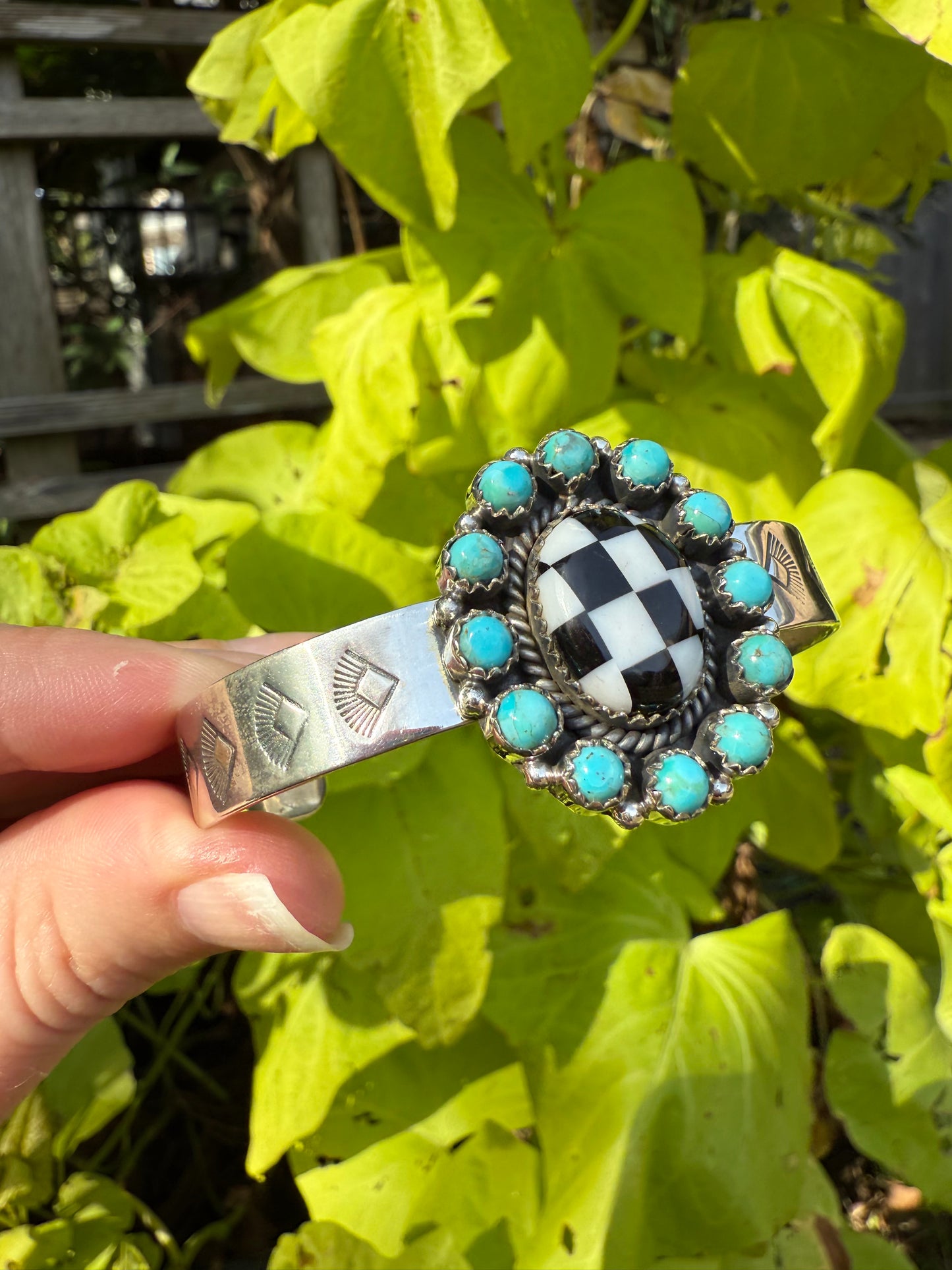 Turquoise and Checkered Flower Style Sterling Silver Cuff